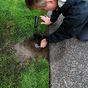 Sprinkler-Doctor-inspecting